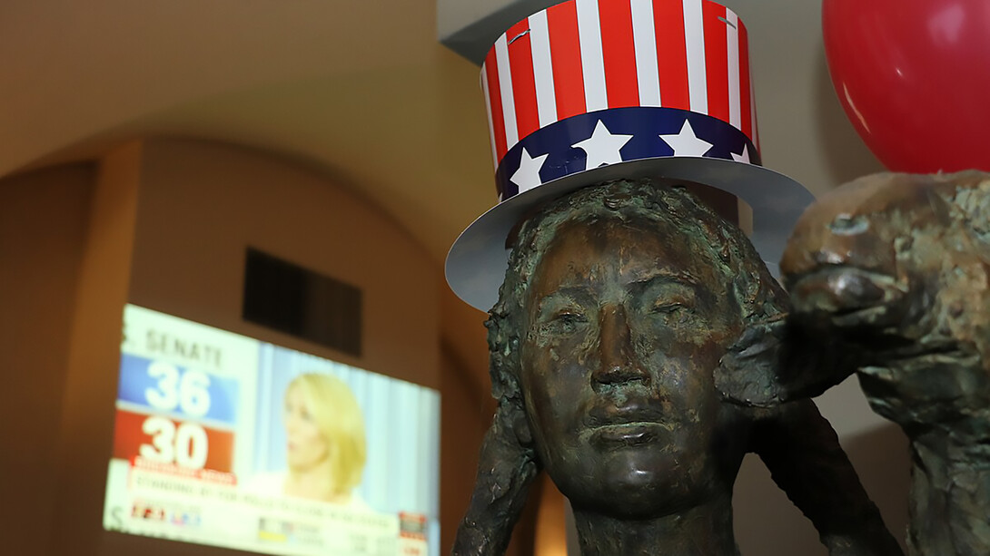 A lively crowd gathers during Election Night in Bern, Switzerland, reflecting the excitement and anticipation of democratic processes in action