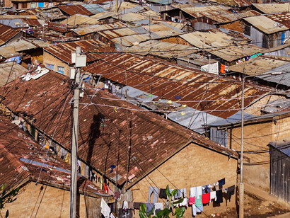 The sprawling expanse of Kibera, a slum in Nairobi Kenya, serves as a powerful reminder of the need for global solidarity in addressing the housing crisis and the impact of campaigns like 'Zero Evictions'