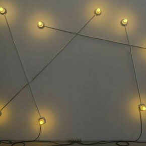 G.T. Pellizzi, “Constellation in Yellow (Figure 3)”, 98” by 132”, light bulbs/porcelain, steel, wire, 2013, Courtesy: Mary Boone Gallery, New York