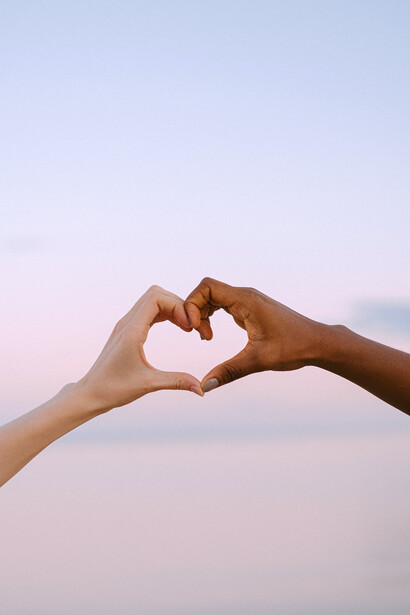Two hands making a heart