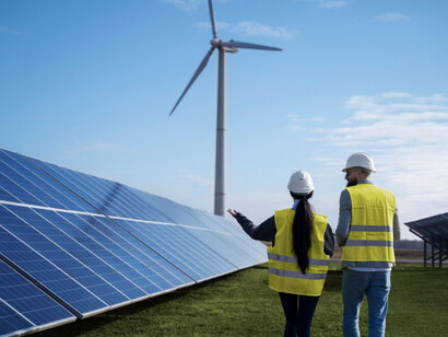 Renewable energy experts examine solar arrays and wind turbines, part of a broader Chine-GCC strategy to diversify energy