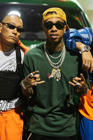 Tyga poses with talented dancers during the recording of his latest music video