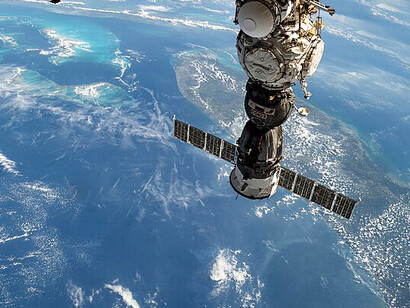 The Soyuz MS-27 spacecraft is seen docked to the Prichal module while the International Space Station passes 269 miles above the Indian Ocean near South Africa. The spacecraft carried NASA astronaut Jonny Kim and Roscosmos cosmonauts Sergey Ryzhikov and Alexey Zubritsky to the station following its April 8 launch
