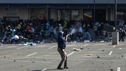 Police in South Africa firing rubber bullets in an attempt to control the crowd as unrest escalates