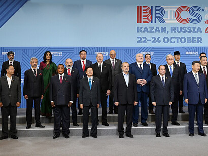 Leaders of the BRICS member states gather for the official family photograph at the 16th BRICS Summit at the Kazan Expo Center, Russia, on October 23, 2024. From left: Abiy Ahmed (Ethiopia), Abdel Fattah el-Sisi (Egypt), Cyril Ramaphosa (South Africa), Xi Jinping (China), Vladimir Putin (Russia), Narendra Modi (India), and Mohammed bin Zayed Al Nahyan (UAE)