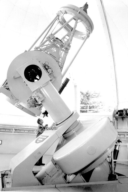 Dr. K.O. Wright observing at the 1.2 metre secondary telescope. In 1962 Hyron Spinard used it to investigate the gases in the atmospheres of Mars, Venus and Jupiter. Photo: National Research Council Canada