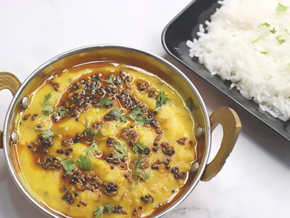 A comforting and traditional Indian home-cooked meal featuring dal chawal