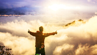 A person enjoying the positive emotions brought about as a result of happiness