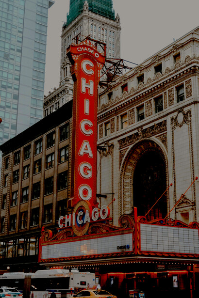 The Chicago Theatre shining brightly at dusk in downtown Chicago, Illinois, United States