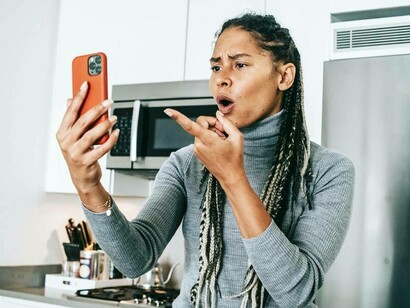 Woman angry at her social media feed