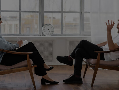 Female psychologist providing therapy to her OCD patient - Illustrating therapeutic intervention for obsessive-compulsive disorder
