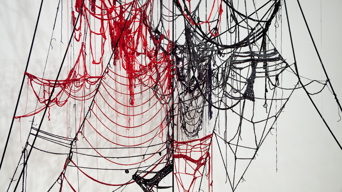Sheila Pepe, Common Sense II, 2010. Crocheted baby and worsted weight yarns, rope, and community participation. Installation view, Hand + Made: The Performative Impulse in Art & Craft, Contemporary Art Museum Houston, Texas.
