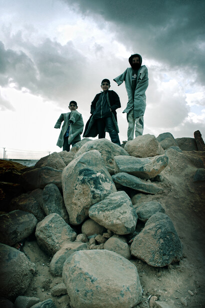 Hermoine Macura, Disabled Refugees, Syria, 18.5” x 12.5”, Photograph on Metallic Paper, Courtesy of Agora Gallery 