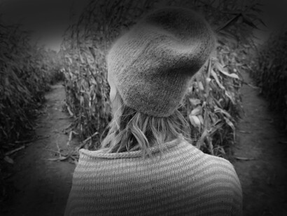 Standing in the corn fields, a woman must decide which path to take, with remnants of her will - of the exercise of the will as a way of facing its annihilators