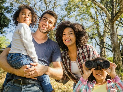 A family spending quality time in the nature, representing the quiet joy of shared presence