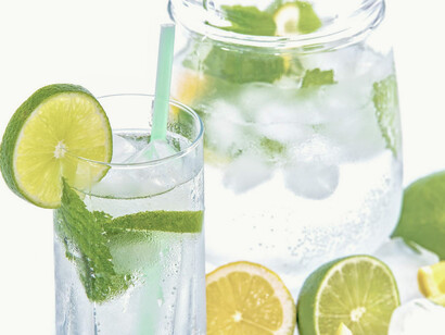 Lime and lemons added to a jug of water adds a bit of flavor to the healthy drink