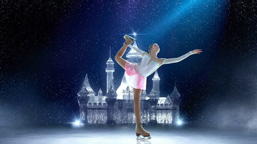 A girl figure skating gracefully on the ice