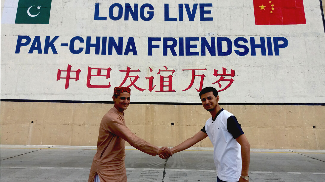 The China–Pakistan Friendship Monument stands along the Khunjerab Pass near the scenic Atabad Lake tunnels in Hunza Valley, marking the deep bond between the two nations on their shared border route