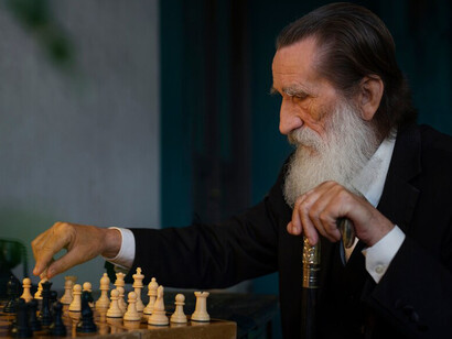 The psychological warfare of chess unfolds as each player anticipates their opponent's next mov