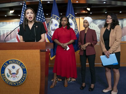 From left, Rep. Alexandria Ocasio-Cortez,  Rep. Ayanna Pressley, Rep. Ilhan Omar, and Rep. Rashida Tlaib, respond to remarks by President Donald Trump