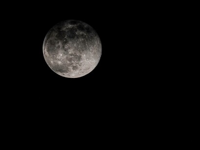 Full moon captured in a quadrant that is not centered