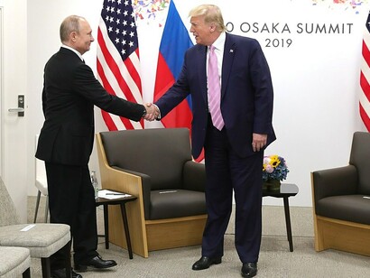 President Vladimir Putin of Russia and President Donald Trump of the United States during their meeting in 2019