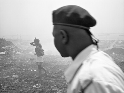 Jo Ractliffe (South African, born 1961)
Woman and her baby, Roque Santeiro market, 2007
From the series Terreno Ocupado
Inkjet print, 2015
On loan from the artist, courtesy Stevenson, Cape Town and Johannesburg
© Jo Ractliffe. Courtesy of Stevenson, Cape Town and Johannesburg