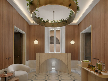 The spa entrance at Six Senses Rome, where hotel guests go to relax in the water, steam, and beautiful stone