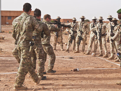 In a display of partnership, American troops work alongside their African counterparts, fostering skills and strategies to address local security challenges