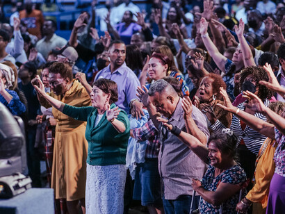 A congregation gathered in a church, illustrating how faith remains a collective experience within modern society