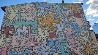 Keith Haring, Tuttomondo, opera di 180 metri quadrati realizzata sulla parete esterna della chiesa di Sant'Antonio Abate a Pisa 