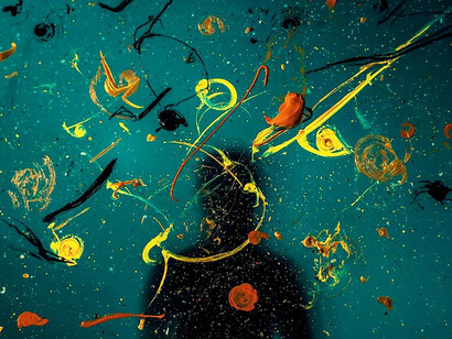 Serene ambiance, person's silhouette among green and yellow water droplets on glass