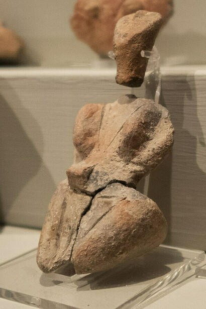 Skorba triangular face and headless figurine, National Museum of Archaeology, Malta