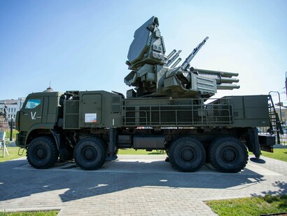 An open-air display of defense missile infrastructure, symbolizing the normalization of advanced warfare capabilities