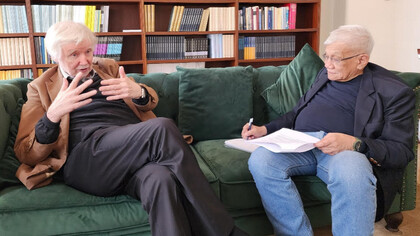 Former Finnish Foreign Minister Erkki Tuomioja (left) and author Walden Bello (right)