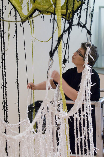 Sheila Pepe, Red Hook at Bedford Terrace (detail with artist), 2008. Shoelaces, cotton yarn, and nautical towline. Variable dimensions. Smith College Museum of Art, Purchased with gifts from members of the Museum’s Visiting Committee in honor of the retirement of Ann Johnson.