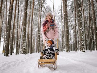 A woman and her child are in pursuit of their next adventure