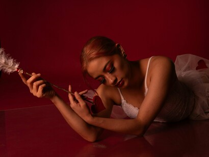 A contemplative figure holding a symbol of love, symbolising the delicate journey of healing after heartbreak