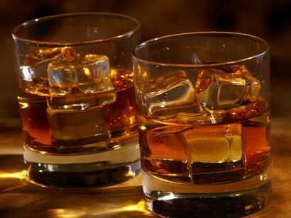 Bourbon sold in the U.S. must be produced within the U.S. from at least 51% corn and stored in a new container of charred oak