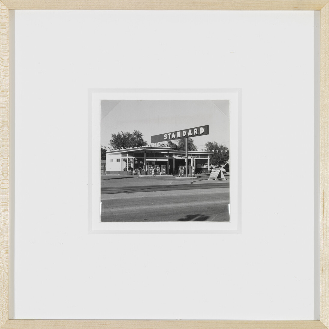 Ed Ruscha, Standard station, Amarillo, Texas, 1962, Gelatin silver print, 3 15/16 x 4 7/8 inches, 10 x 12.4 cm. © Ed Ruscha. Courtesy Gagosian Gallery. Photography by Robert McKeever