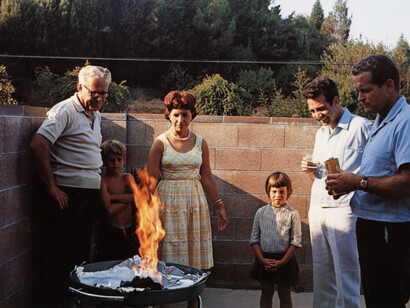 Guy Stricherz, Americans in Kodachrome 1945-65, Flaming Barbeque, Tarzana, California. Photographer: Andrea Katres, 1965. Courtesy of Rosegallery