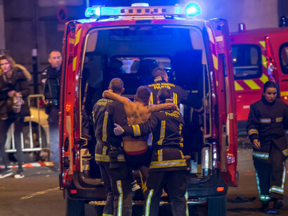 Wounded people are evacuated from the Stade de France. Photograph: Ian Langsdon/EPA