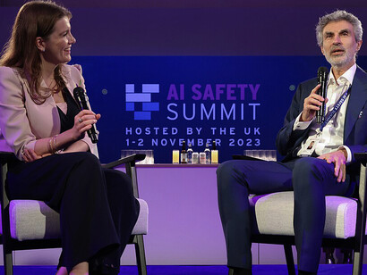 In London, United Kingdom, Secretary of State for Science, Innovation, and Technology, Michelle Donelan, speaks with Canadian computer scientist Yoshua Bengio at the UK AI Summit held at Bletchley Park