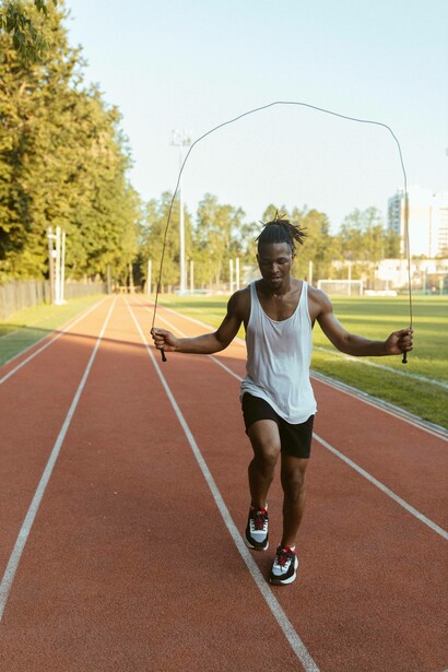 A man keeps fit by jumping rope