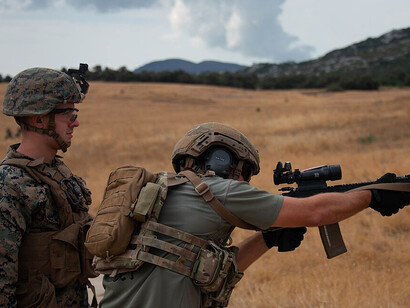 A Spanish soldier fires an M240B machine gun during a joint drill in Ronda, Spain, on September 4, 2019. U.S. Marines from SPMAGTF-CR-AF trained alongside Spanish forces to strengthen crisis response and regional security