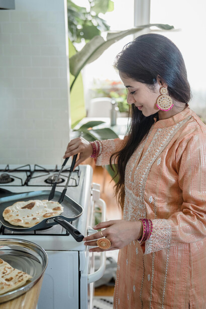 An Indian mom takes over a small kitchen with her flavorful cooking