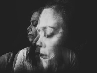 Vanishing memories, fragmented recollections, and the distortion of past events, as faces fade into oblivion