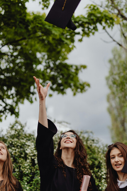 Female graduates at a university commencement ceremony