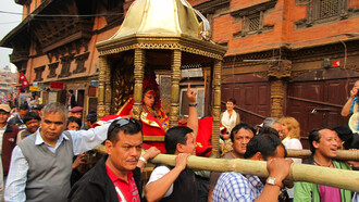 The living goddess Kumari returns to the Kumari Ghar after attending the Seto Machhindranath parade in Kathmandu, Nepal