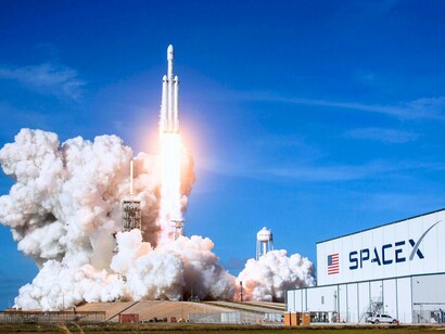 A SpaceX vehicle lifting off, reflecting how technological leaps enable new participants in space